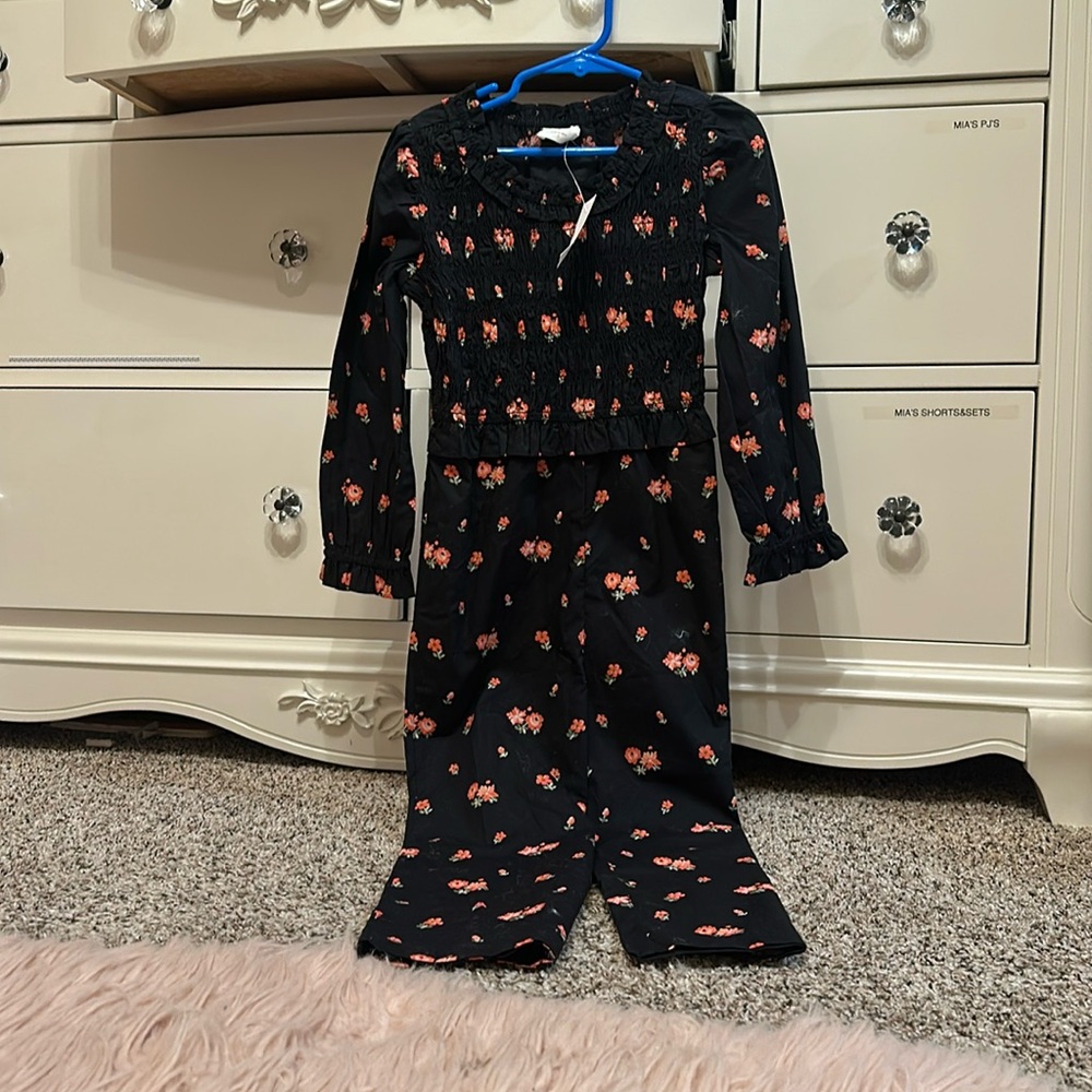 Size 5 one piece jumpsuit flowers and black brand new